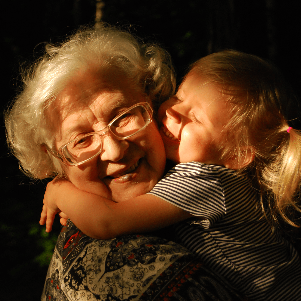 old-women-and-young-girl-hugging